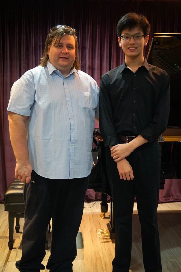 Dr Krystian Tkaczewski with piano student at Tanglewood Music School Bukit Timah