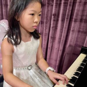 Young Girl Playing Piano